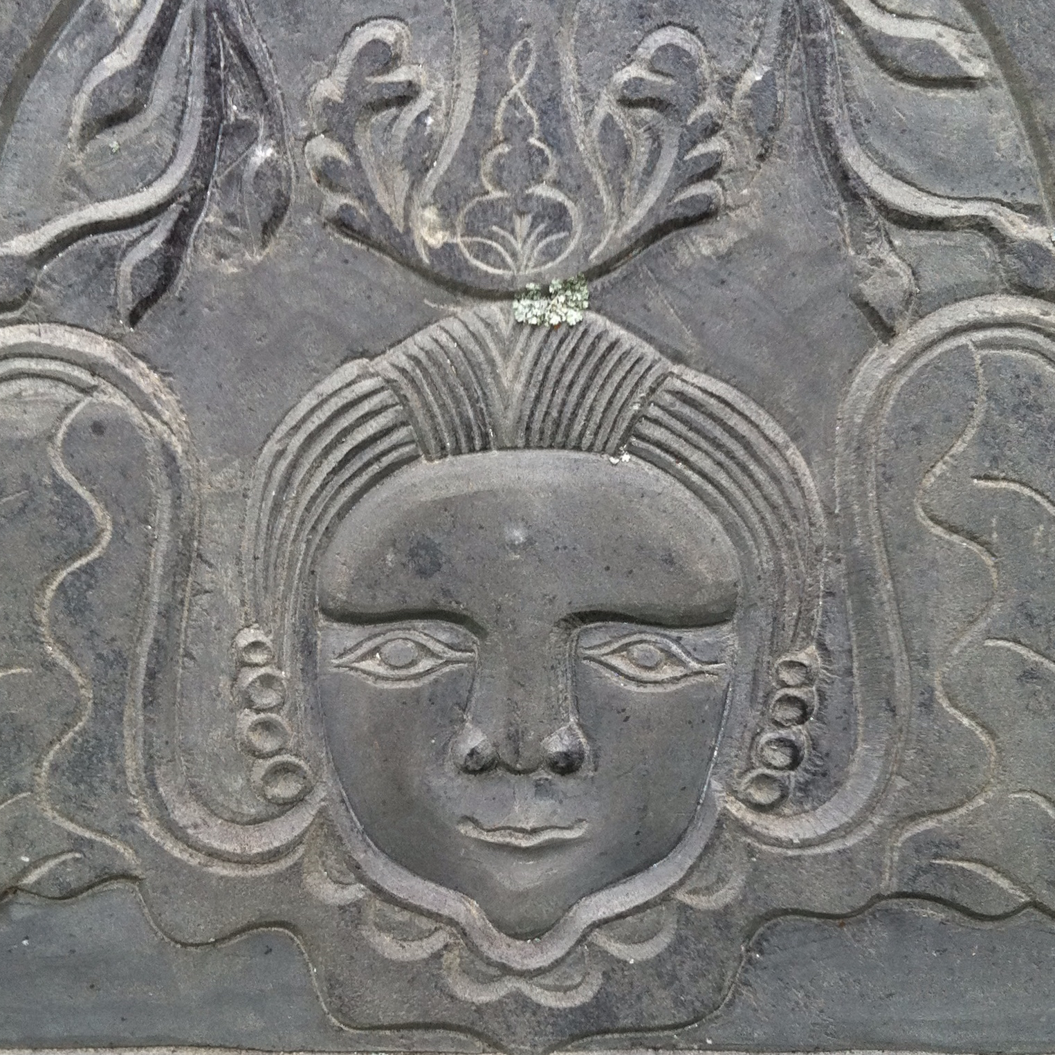 Head of angel from carved gravestone in Quincy MA